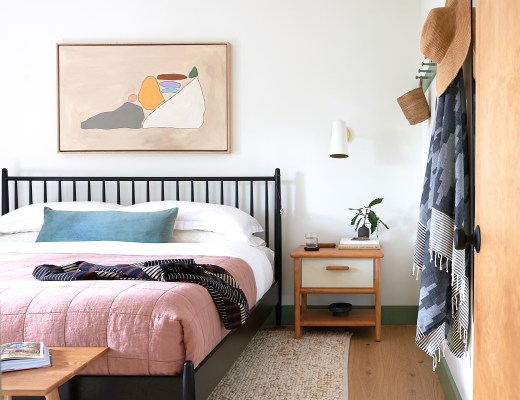 Modern Oak Floors, Spindle bed, and sconce over nightstand