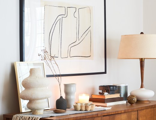 Ceramic vessels styled on a credenza