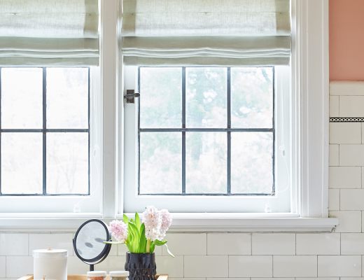 Custom linen roman shades in blush bathroom