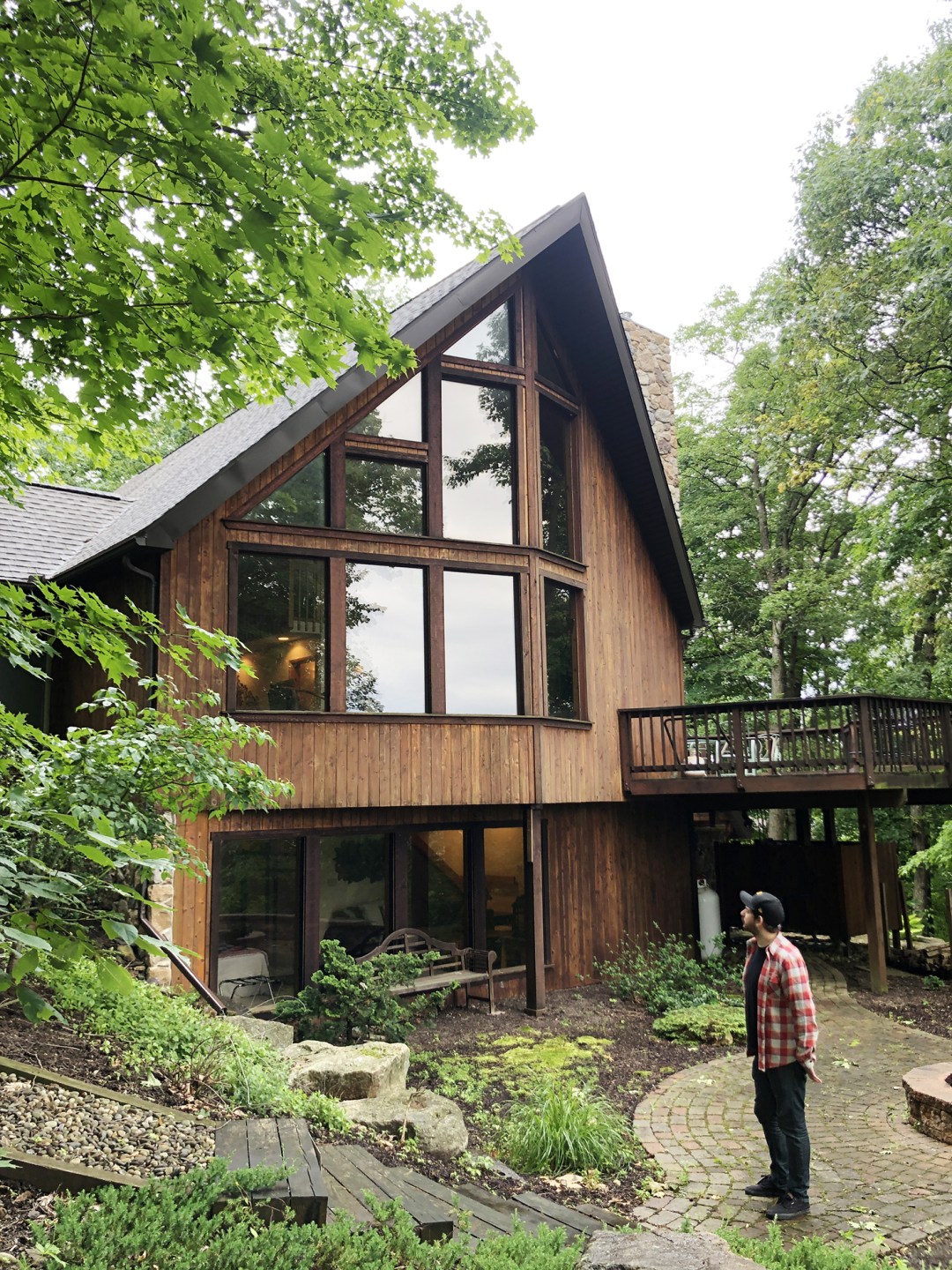 A-frame style chalet in the woods.